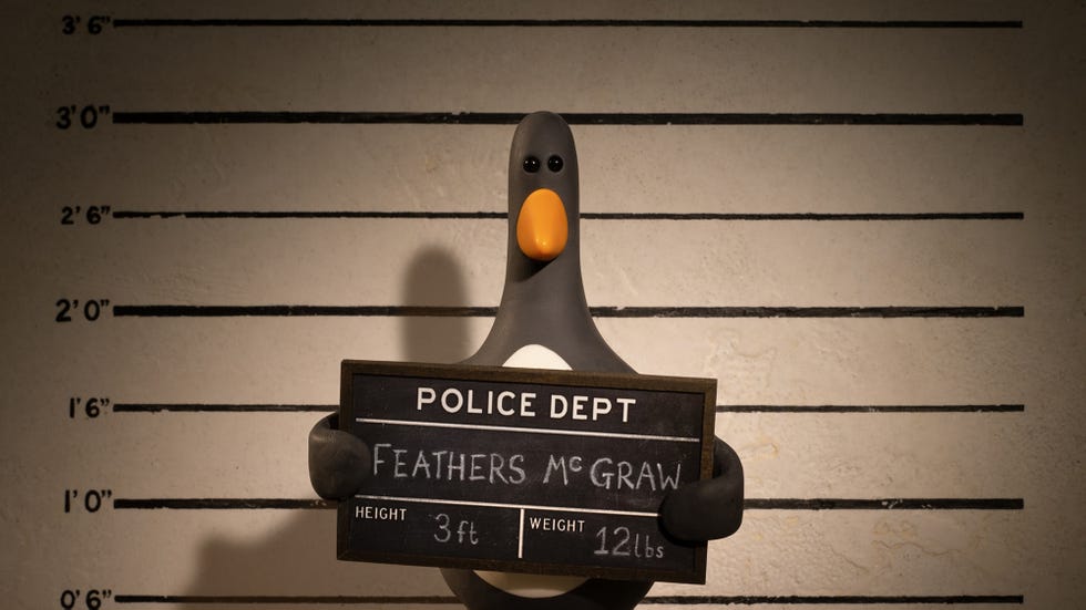a mug shot of feathers mcgraw in a scene from wallace and gromit vengeance most fowl, a good housekeeping pick for best kids' movies 2025