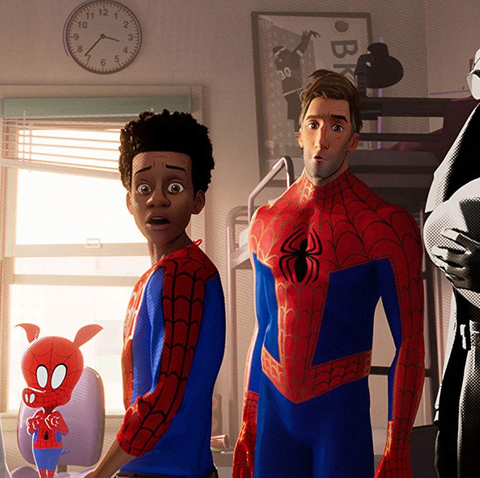 Multiple spider-themed super heroes gather in a room in a scene from Spider-Man: Into the Spider-Verse, a Good Housekeeping pick for best tween movies multiple spiderthemed super heroes gather in a room in a scene from spiderman into the spiderverse, a good housekeeping pick for best tween movies