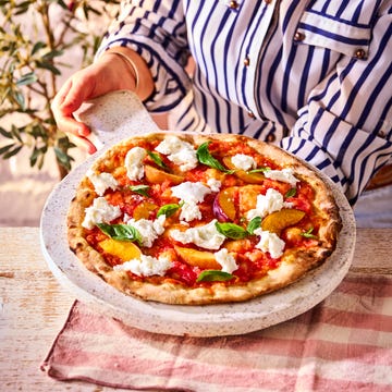 mozzarella, peach, basil and tomato pizza