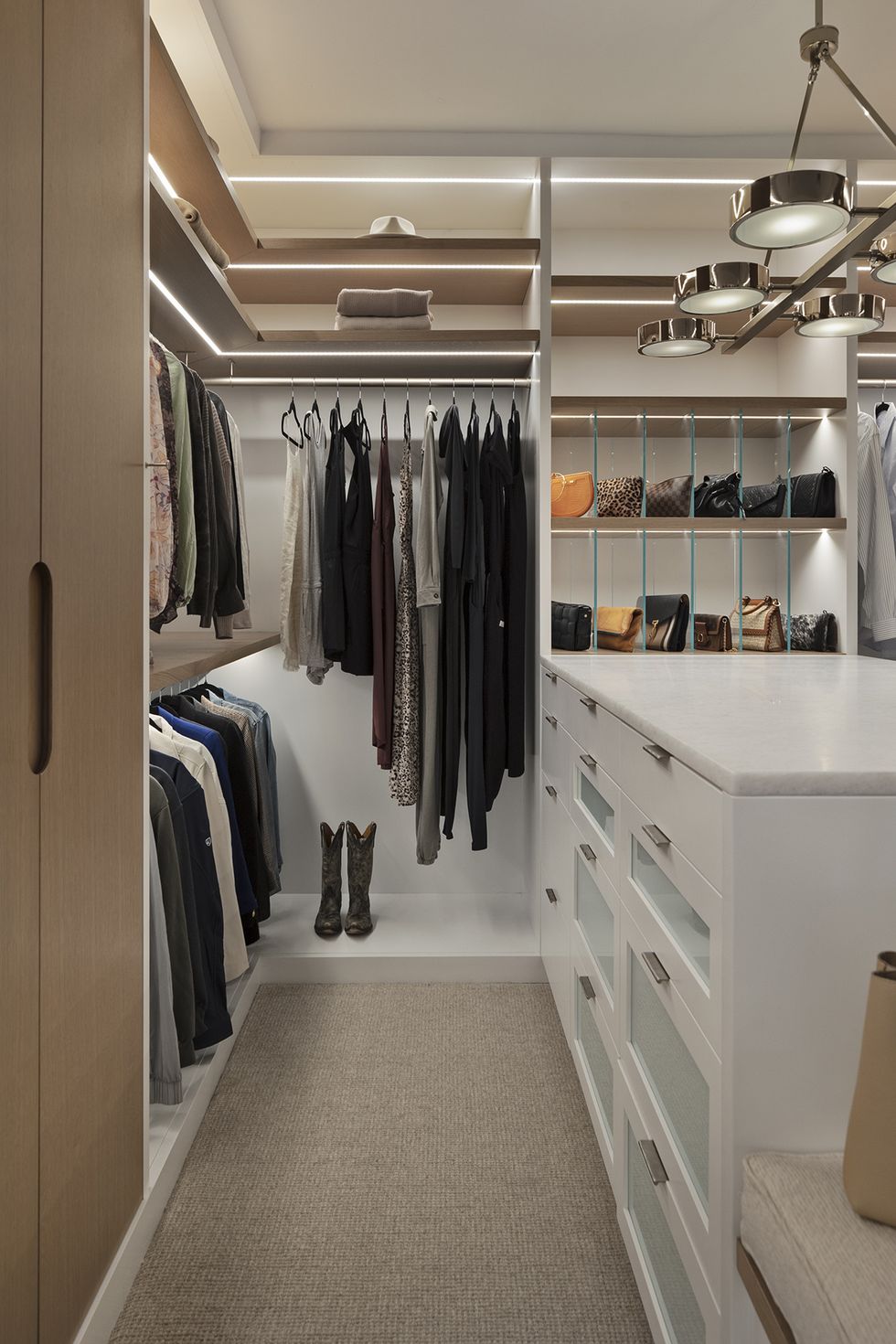 a closet with clothes