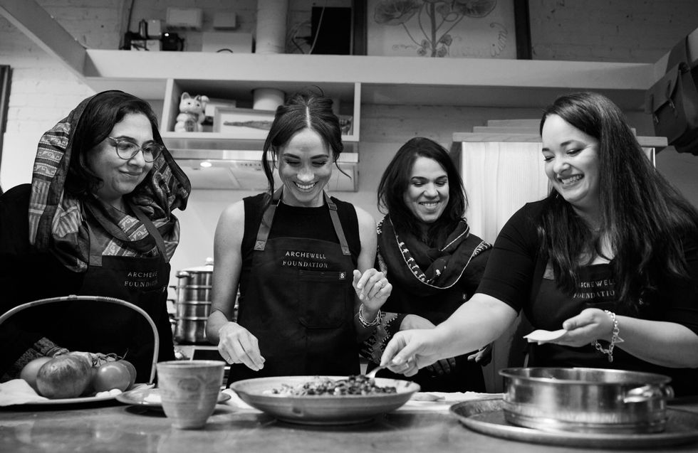 a group of women cooking