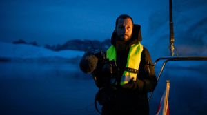 a person holding a camera