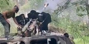 mt lb apc with d 44 field gun mounted on top firing in ukraine with 67th mechanized brigade