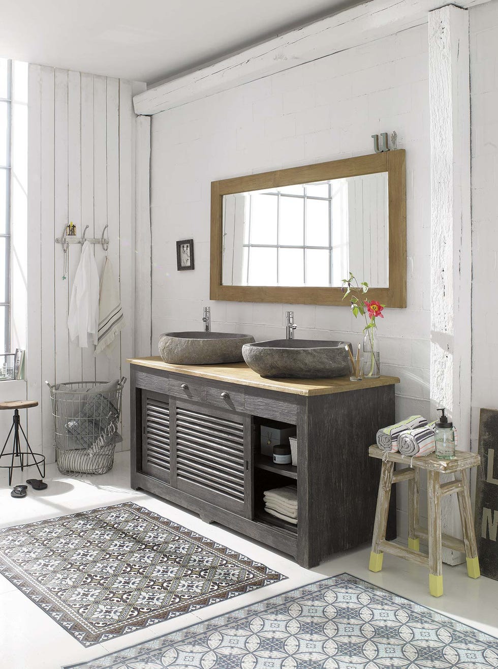 mueble de baño con dos lavabos de piedra