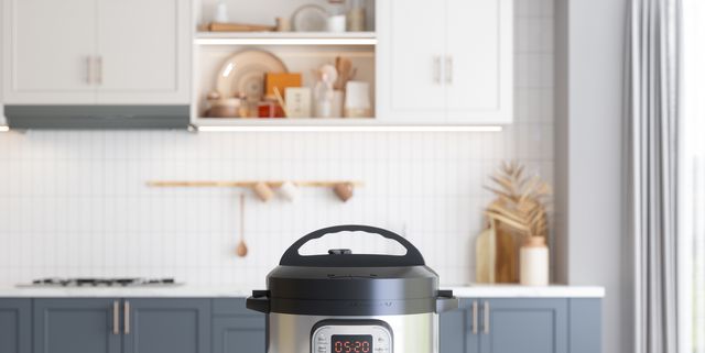 https://hips.hearstapps.com/hmg-prod/images/multi-cooker-on-empty-marble-surface-with-blurred-royalty-free-image-1697135100.jpg?crop=1.00xw:0.753xh;0,0.247xh&resize=640:*