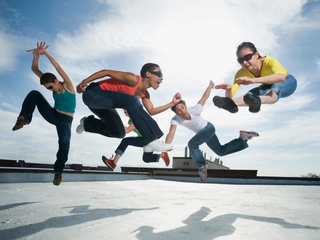 Multi-ethnic group performing modern dance