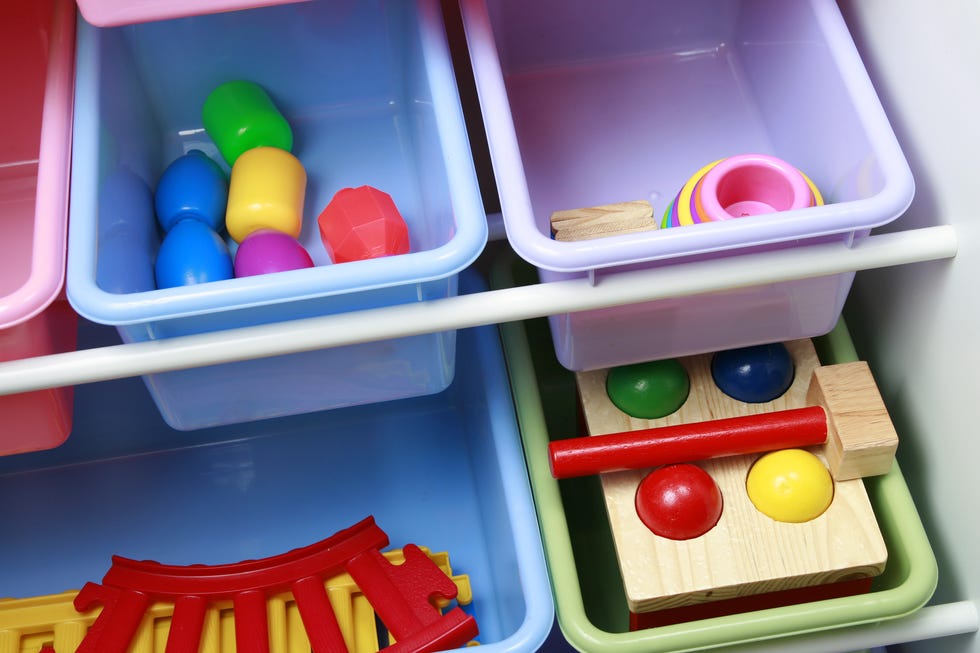 multiple colorful plastic bins used for toy storage