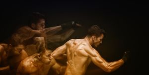 Multiple Exposure - Muscular man in combat pose