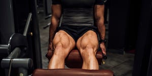 muscular man doing legs in the gym