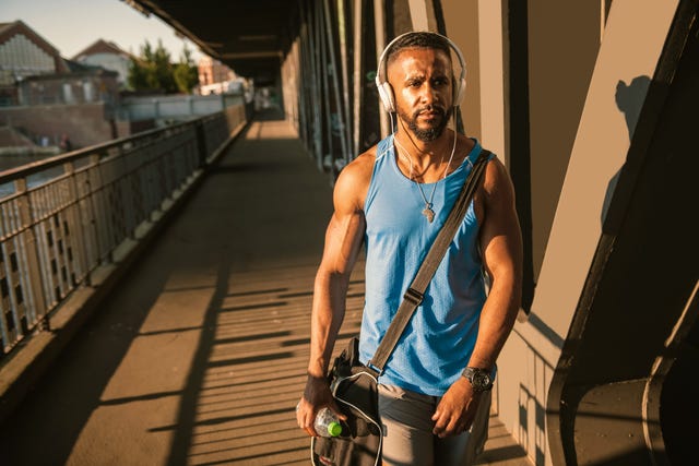 muscular man in sportswear walking to the gym