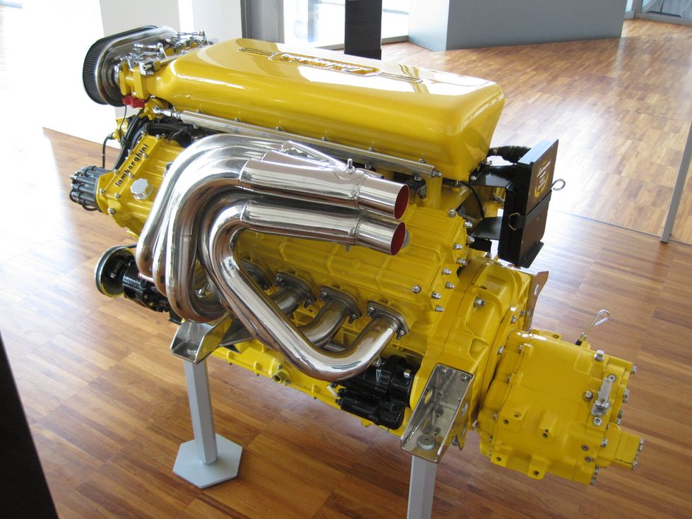 Yellow, Engine, Auto part, Machine, Automotive engine part, Vehicle, 