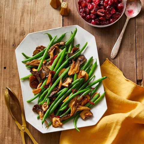 mushroom and chile garlic green beans on a white plate