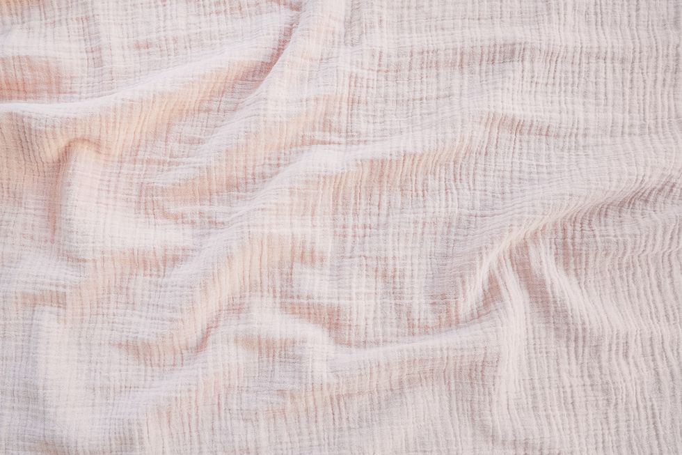 muslin cloth texture background in neutral tones muslin cotton fabric of plain weave muslin is a soft, woven, 100 percent cotton multi layer cloth popular for baby cloths and blankets