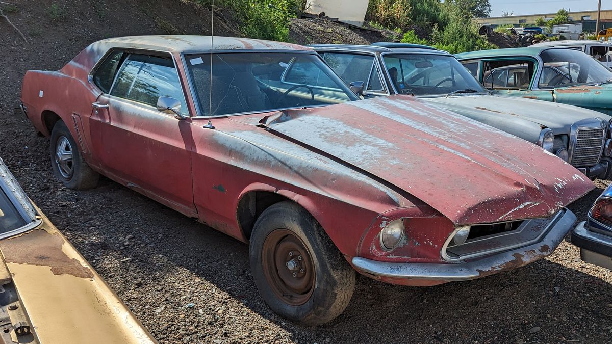 1969 ford mustang coupe in colorado wrecking yard
