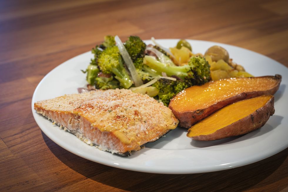 mustard crusted salmon dinner with roasted sweet potato, broccoli and chickpeas