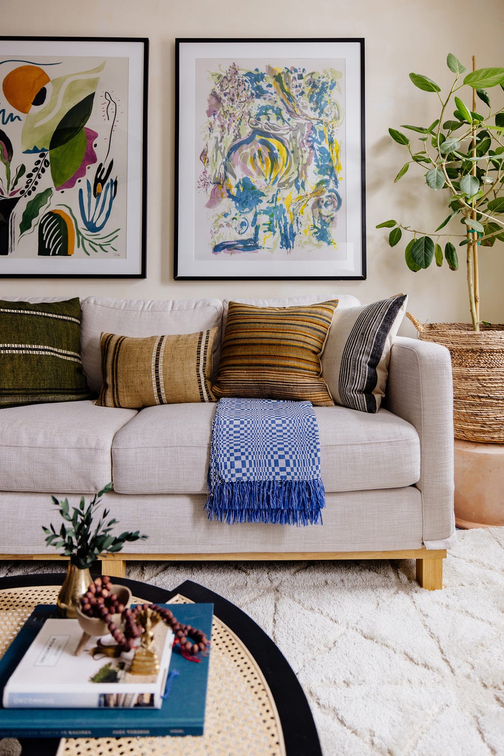 living room with colorful framed art living room with colorful framed art