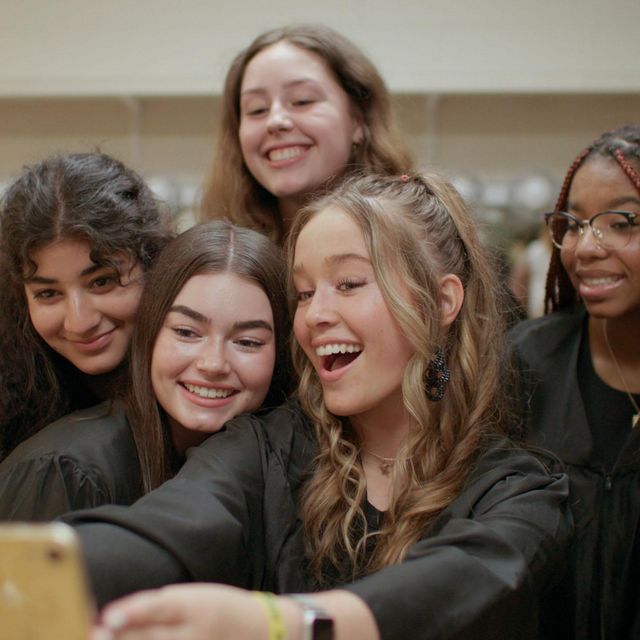 a group of women smiling