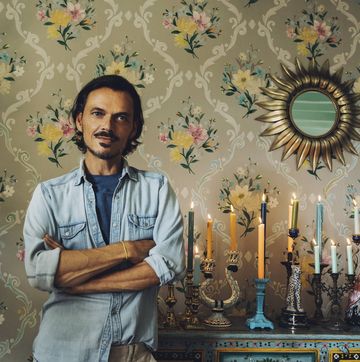 matthew williamson with his candlestick collection