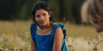 a woman in a blue dress