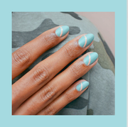 almond shaped nails with blue nail polish and square shaped nails with a floral manicure