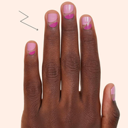 on the left a hand in a pink border with black matte nail stickers and gold metallic moons on top, and on the right a hand with two toned pink nail stickers on a cream background