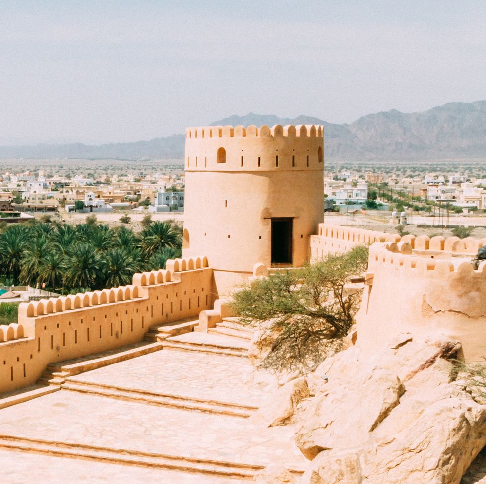 a date palm plantation sits behind nakhal fort in oman approximately 120 kilometres to the west of muscat, nakhal fort has a history which dates back to the pre islamic period it was re built by omani architects in the 17th century