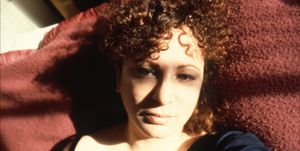 nan goldin, self portrait with eyes turned inward, boston, 1989