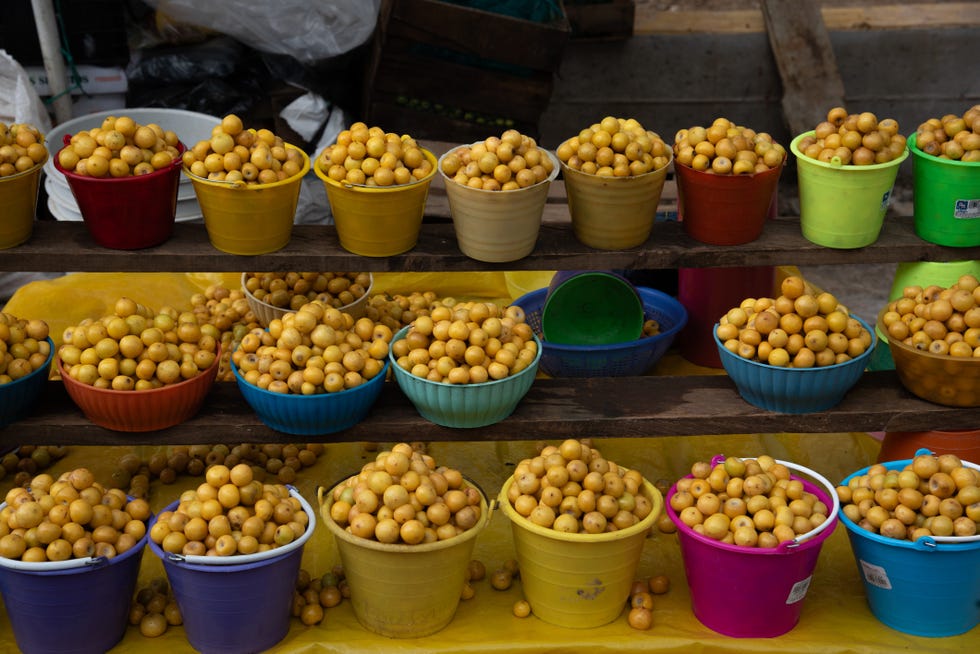 tropical aroma nance fruit display at san juan chamula market