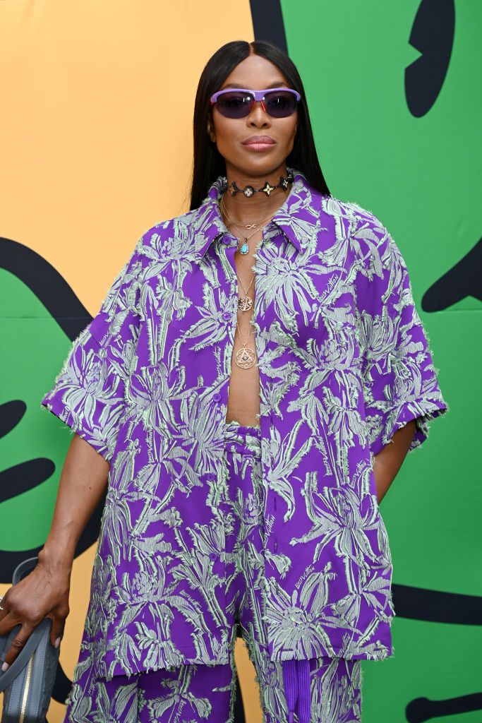 Naomi Campbell Cools Down In Undone Tropical Top for Louis Vuitton