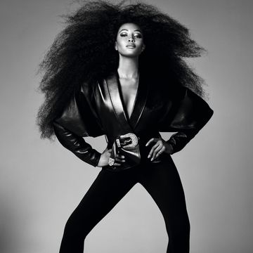 an editorial image of model naomi campbell in black leather jacket