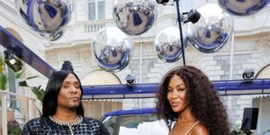 naomi campbell and law roach at cannes wearing archive chanel
