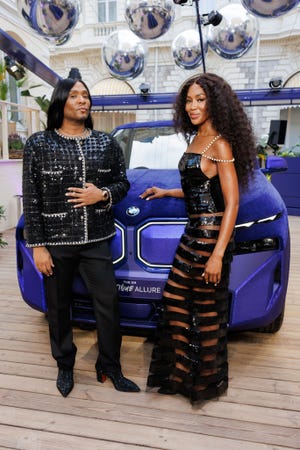 naomi campbell and law roach at cannes wearing archive chanel