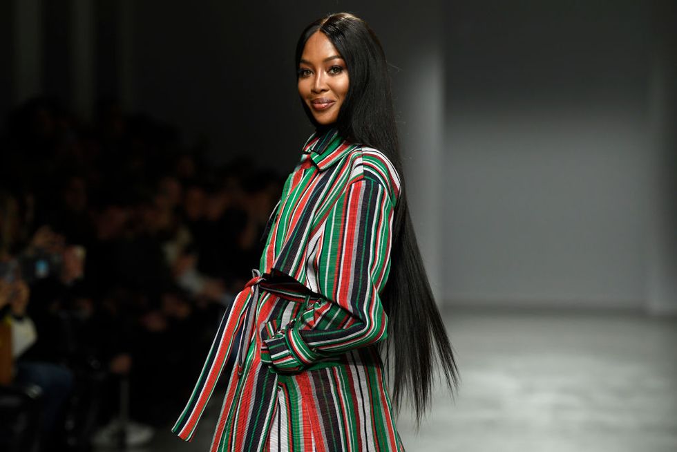 Naomi Campbell displays a creation by US designer Marc Jacobs for