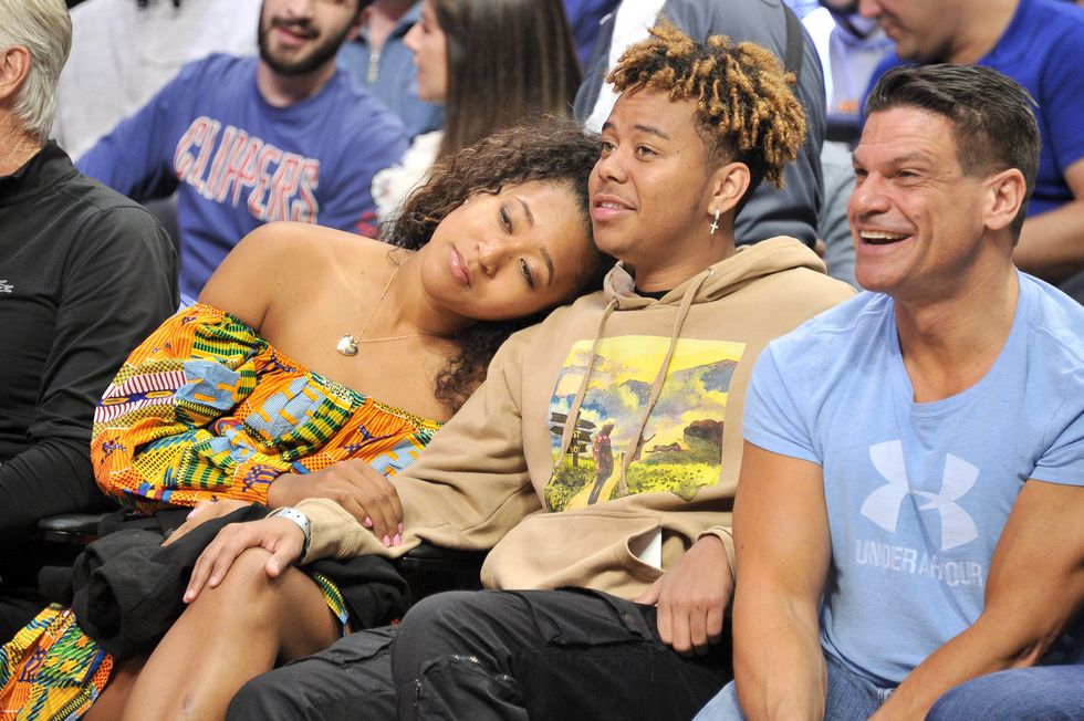 naomi osaka and cordae at a december 2019 clippers game