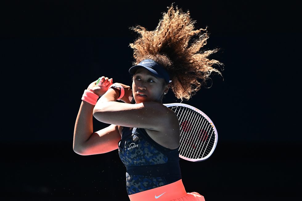 melbourne, australia   february 18 naomi osaka of japan  plays a backhand in her women’s singles semifinals match against serena williams of the united states during day 11 of the 2021 australian open at melbourne park on february 18, 2021 in melbourne, australia photo by quinn rooneygetty images