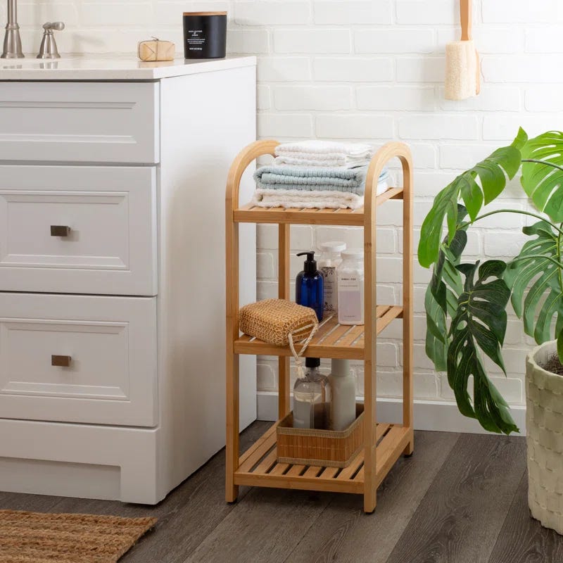 wooden shelving unit with bath items in a bathroom setting