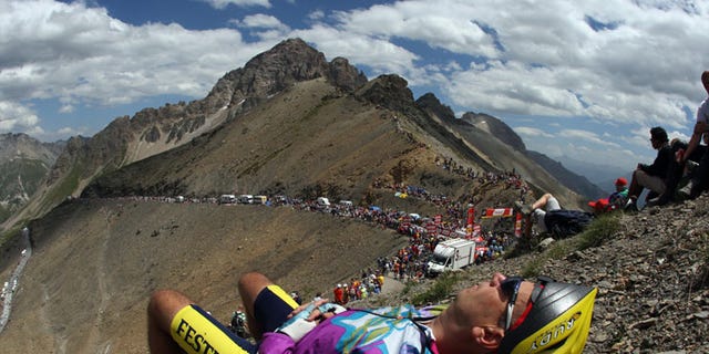 cyclist napping at tour de france