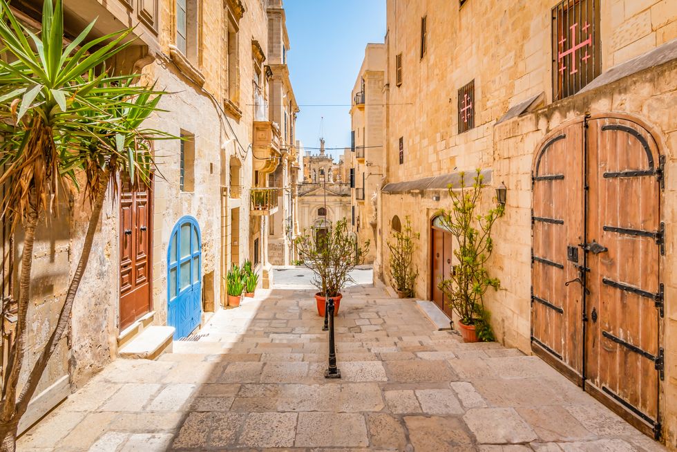narrow street in city centre of valletta, malta