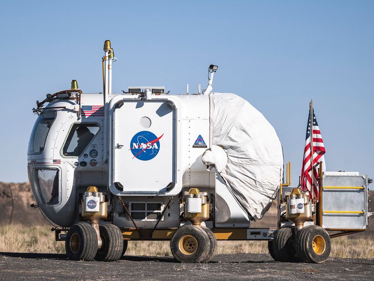 a side view of nasa's desert rats prototype lunar rover