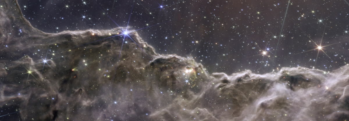 webb reveals cosmic cliffs glittering landscape of star birth