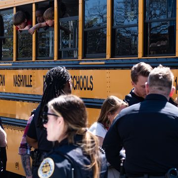 nashville, tn march 27 school buses with children arrive at woodmont baptist church to be reunited with their families after a mass shooting at the covenant school on march 27, 2023 in nashville, tennessee according to initial reports, three students and three adults were killed by the shooter, a 28 year old woman the shooter was killed by police responding to the scene photo by seth heraldgetty images