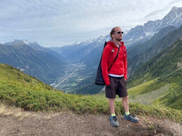 nathaniel dye on a path in the mountains