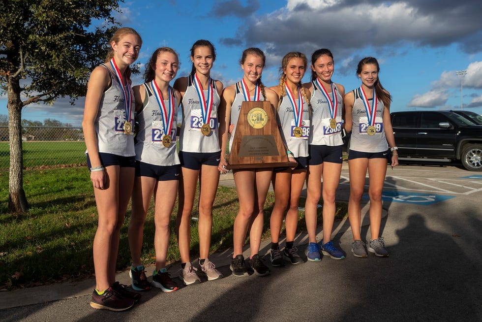 flower mound high school cross country team poses for a photo with their first place trophy in the team competition during the girls uil class 6a state cross country meet in round rock, texas, tuesday, nov, 24, 2020 natalie cook is third from the right stephen spillmanspecial contributor