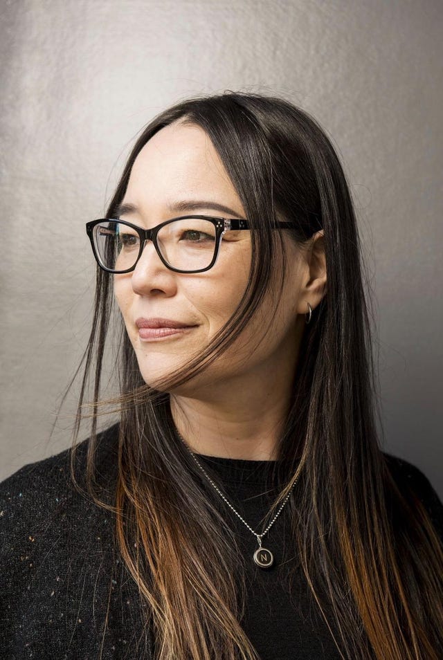 speaker natalie neff's headshot, pictured in front of a gray background