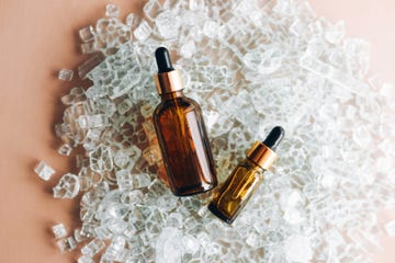 natural cosmetic oil in a glass bottle with a pipette