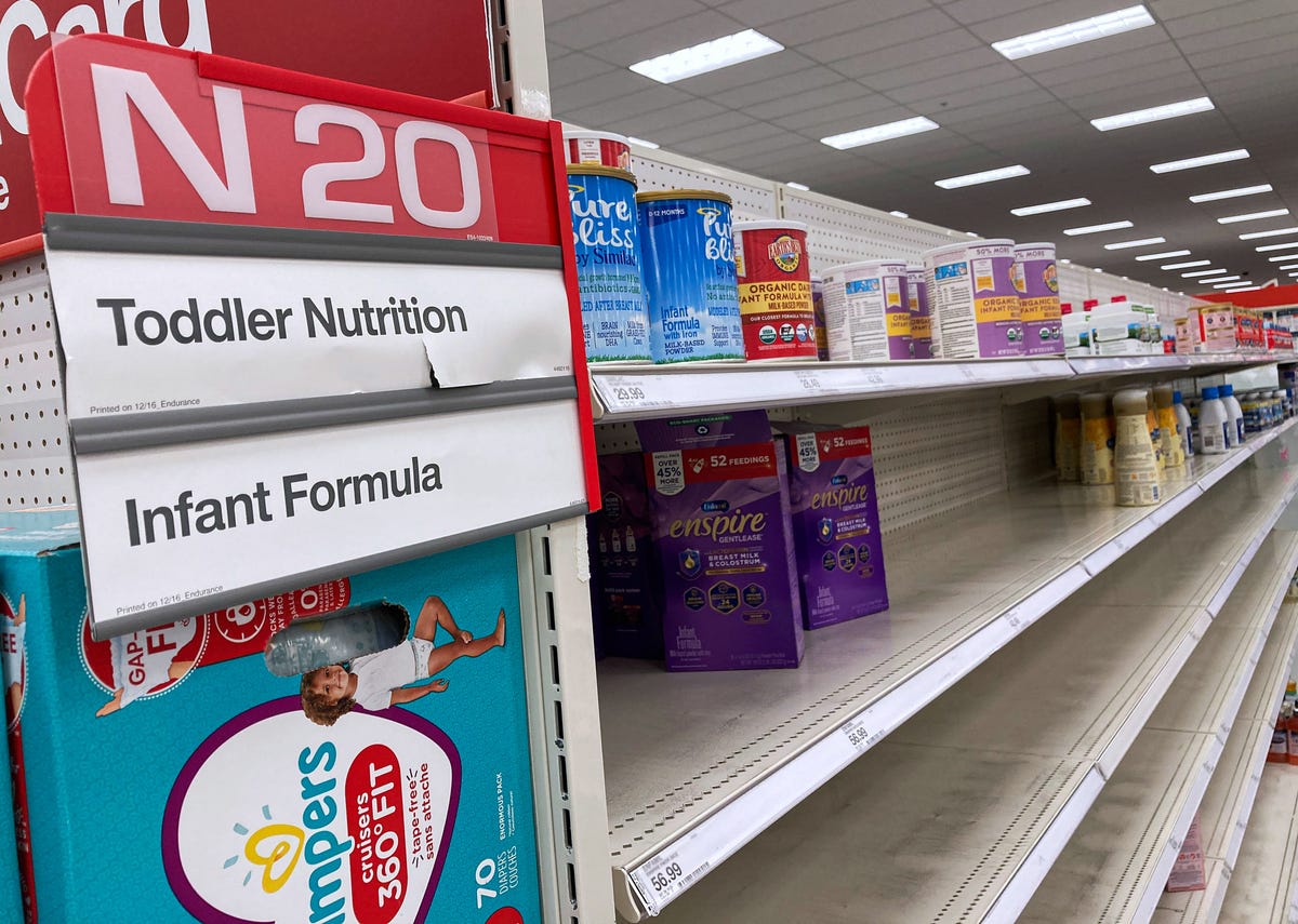a nearly empty baby formula display shelf is seen at target
