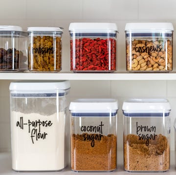 neatly organized transparent canisters for baking ingredients