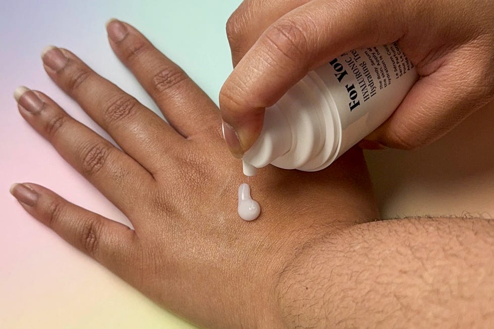 nicole applying necessaire the body serum