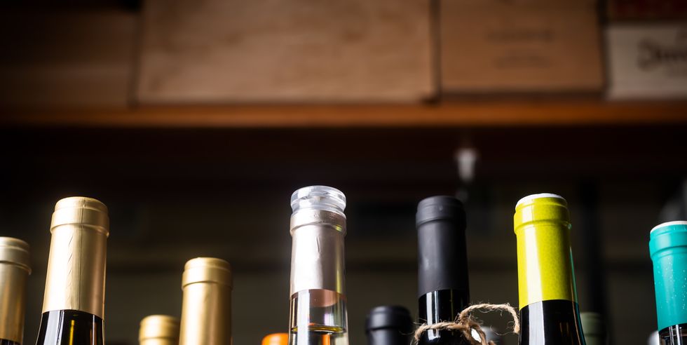 neck of wine bottles in a liquor store in europe