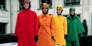 fashion models model brightly colored sports coats with matching hats, and slacks or long spat type stockings, by guy laroche from his winter and autumn collections for 1971 1972
